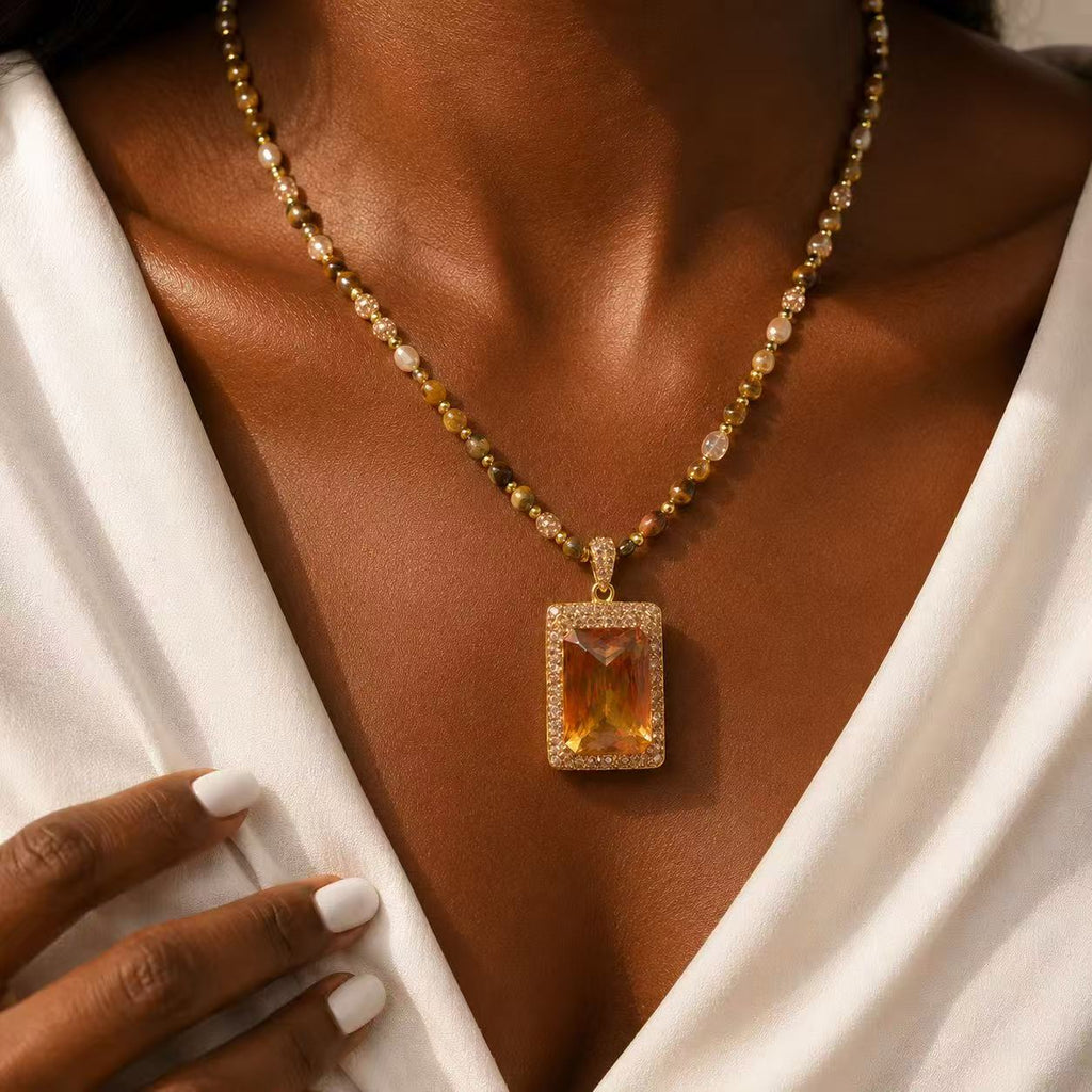 Elegant Gold Tone Necklace with Amber Pendant and Beaded Chain for Women's Fashion Jewelry