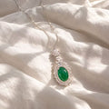 Elegant Emerald Pendant Necklace with Sparkling Halo Design and Delicate Chain for Women