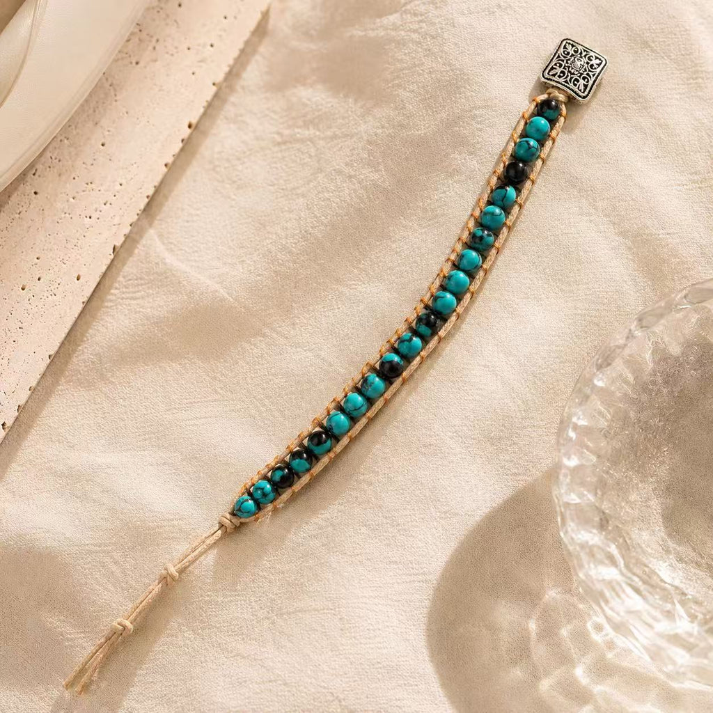 Elegant Turquoise Beaded Bracelet with Intricate Silver Charm for Women's Fashion Accessory