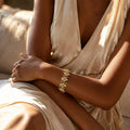 Elegant Gold Tone Bracelet with Green Gemstones and Delicate Design for Women