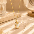 Elegant Gold Leaf Pendant Necklace with Pearl-like Stone and Crystal Accents for Women's Fashion