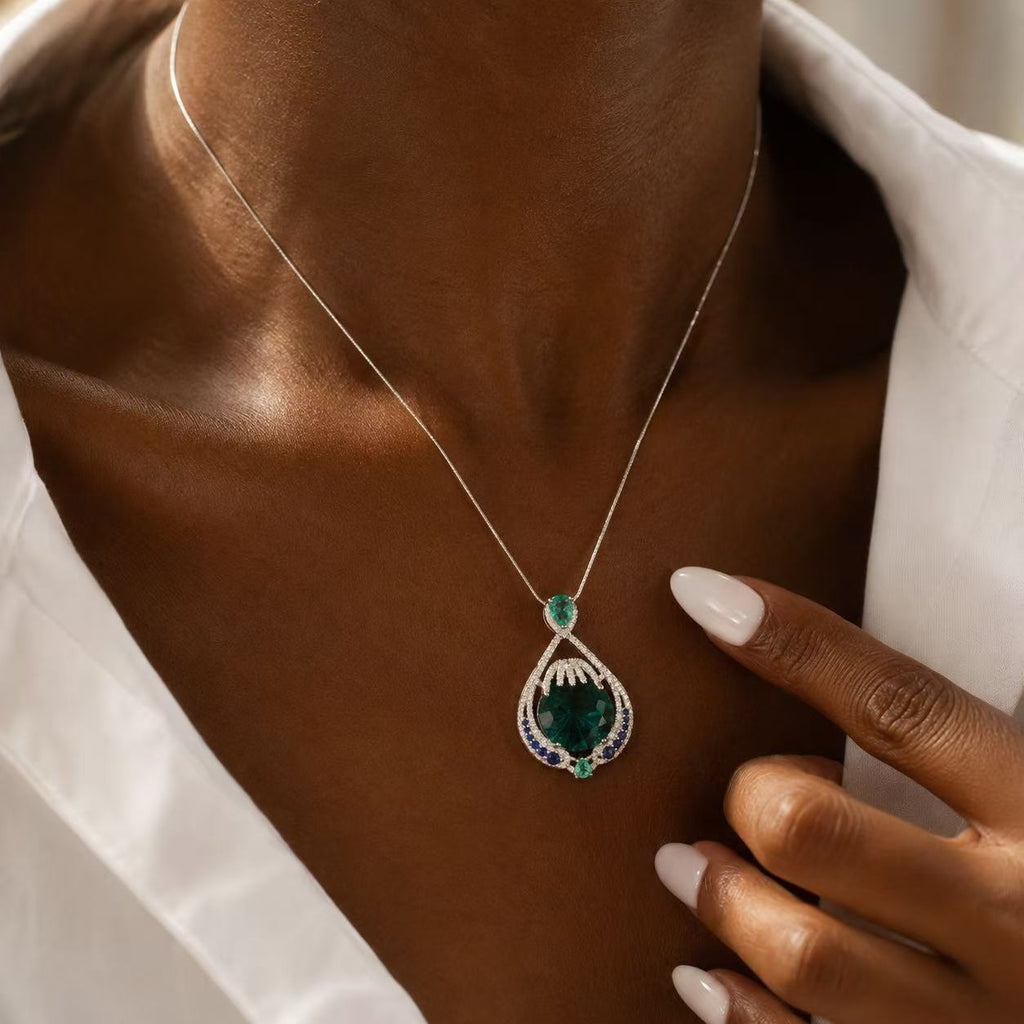 Green Gemstone Teardrop Pendant Necklace Elegant Statement Jewelry Elegant Emerald Teardrop Pendant Necklace with Blue Accents and Silver Chain for Women