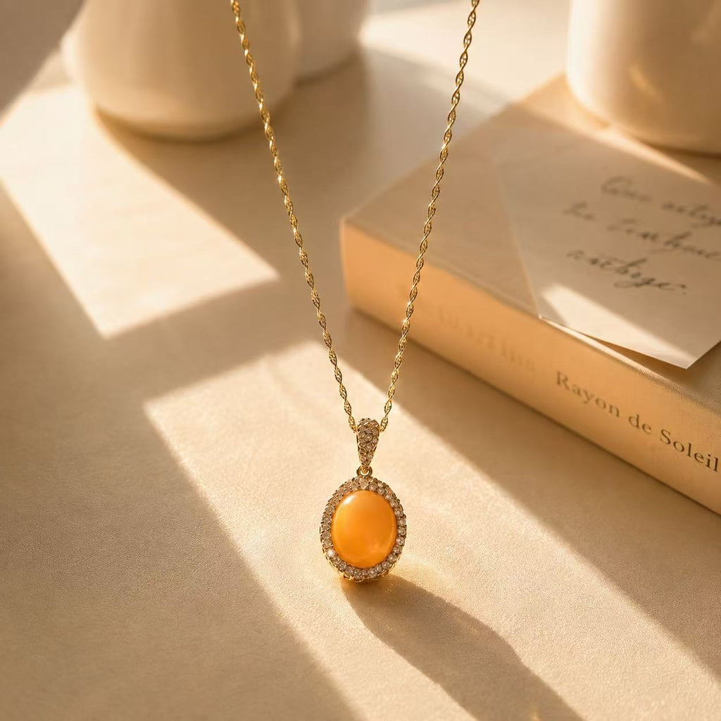 Orange Gemstone Necklace for Women Elegant Gold Chain Necklace with Orange Oval Pendant and Sparkling Halo Design for Women