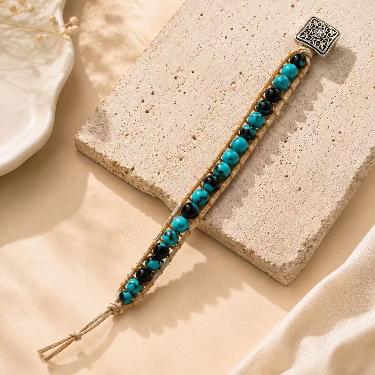 Elegant Turquoise Beaded Bracelet with Intricate Silver Charm for Women's Fashion Accessory