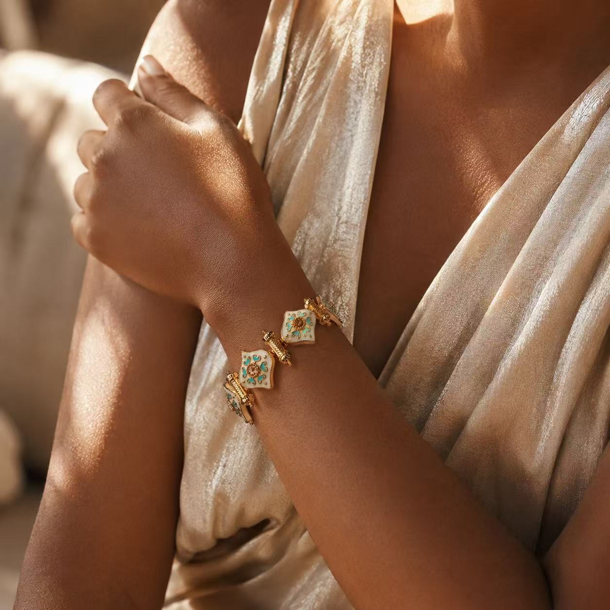 Elegant Gold Tone Bracelet with Green Gemstones and Delicate Design for Women