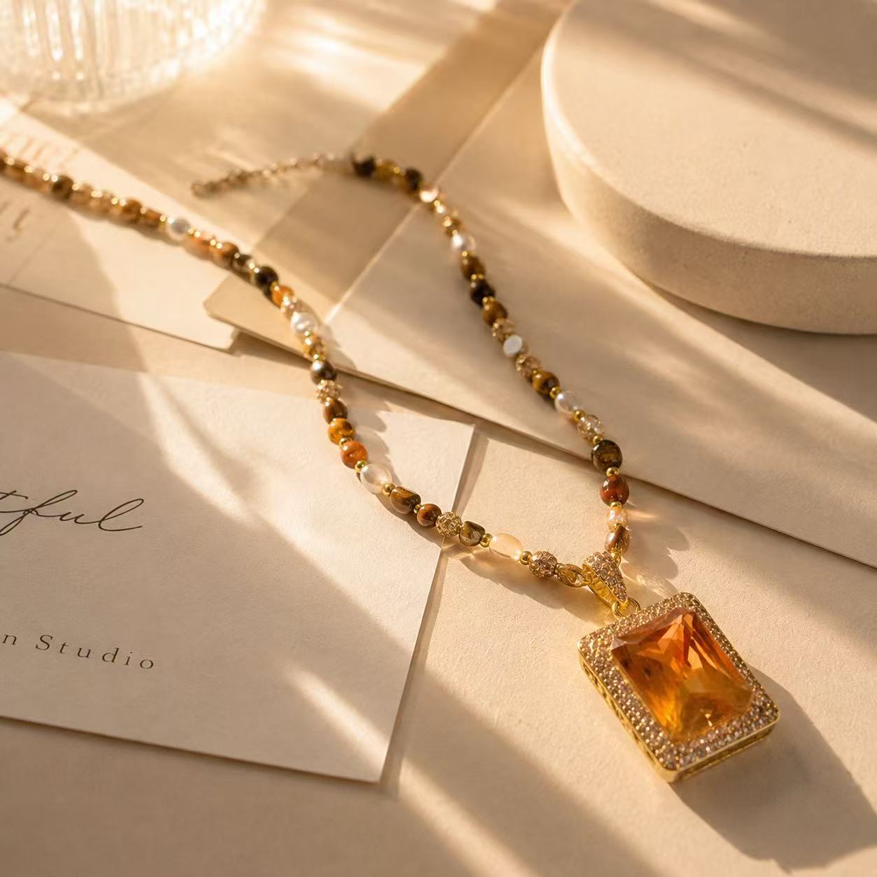 Elegant Gold Tone Necklace with Amber Pendant and Beaded Chain for Women's Fashion Jewelry