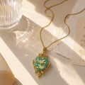 Elegant Heart-Shaped Pendant Necklace with Intricate Floral Design and Gold Chain for Women