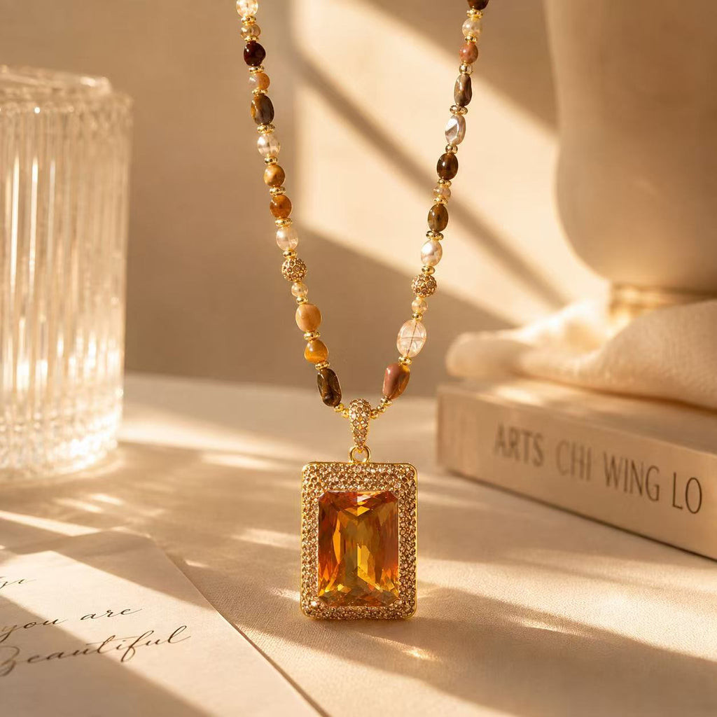 Elegant Gold Tone Necklace with Amber Pendant and Beaded Chain for Women's Fashion Jewelry