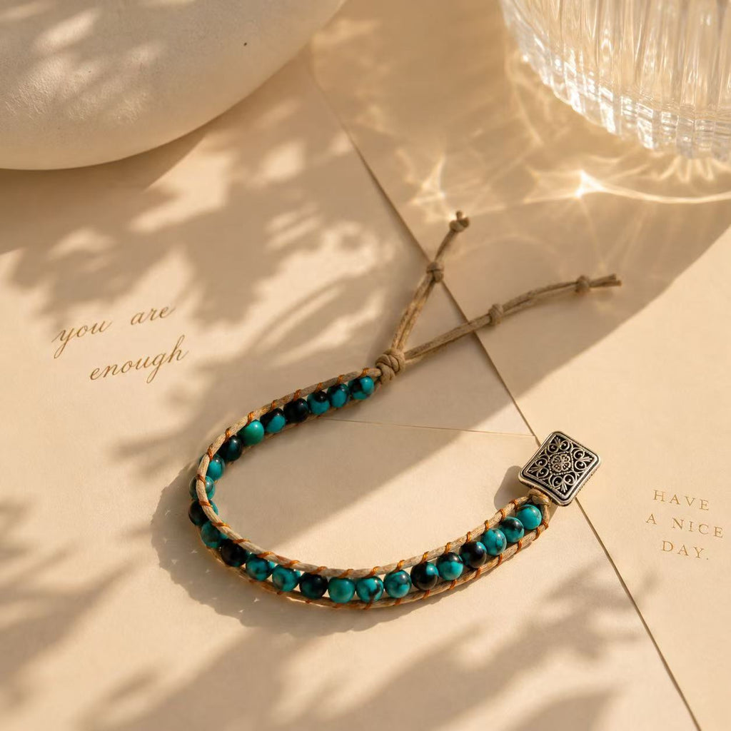 Elegant Turquoise Beaded Bracelet with Intricate Silver Charm for Women's Fashion Accessory