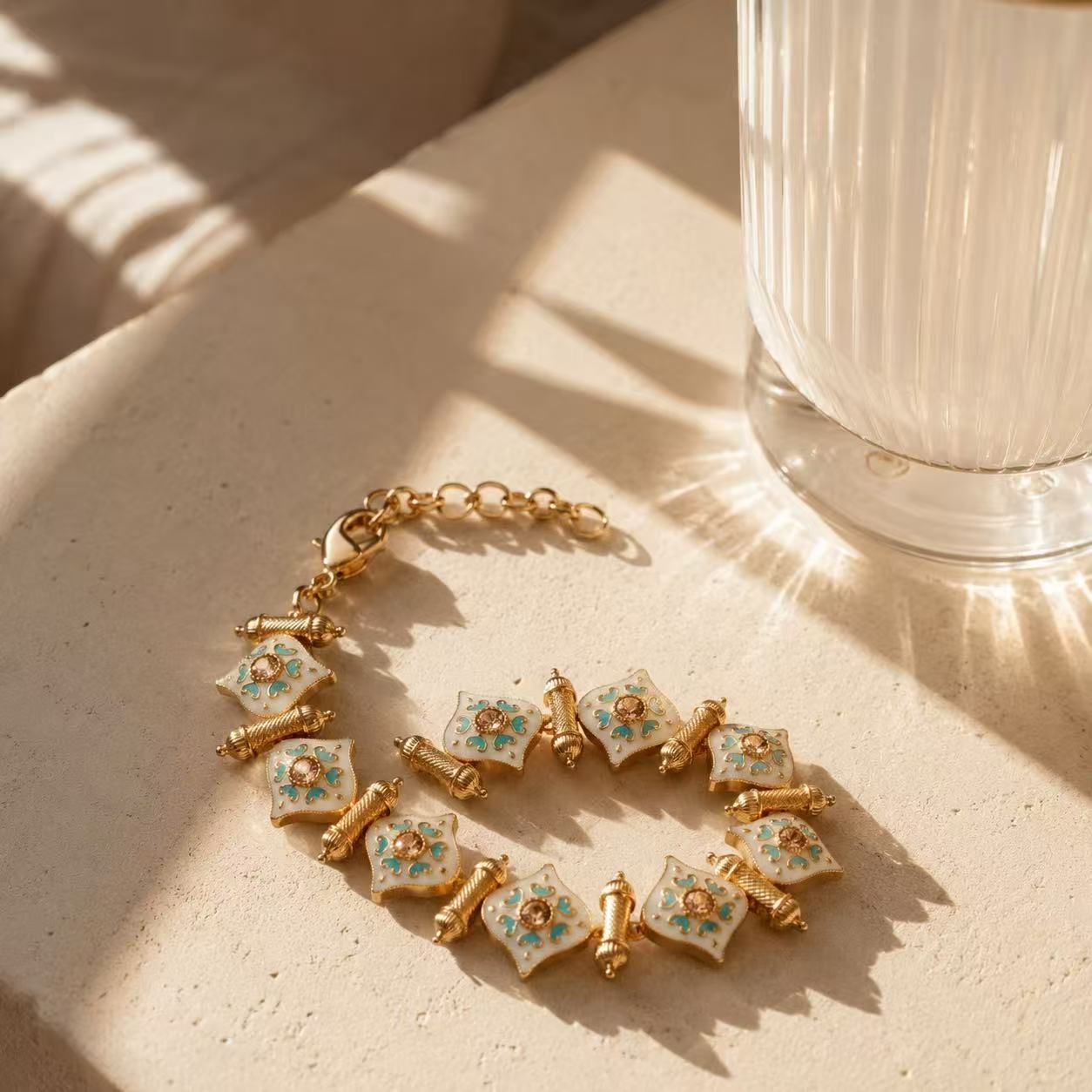Elegant Gold Tone Bracelet with Green Gemstones and Delicate Design for Women