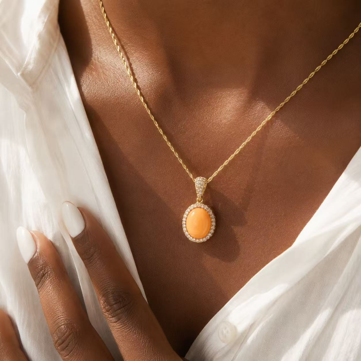 Orange Gemstone Necklace for Women Elegant Gold Chain Necklace with Orange Oval Pendant and Sparkling Halo Design for Women