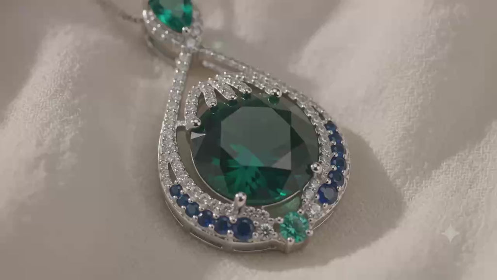 Green Gemstone Teardrop Pendant Necklace Elegant Statement Jewelry Elegant Emerald Teardrop Pendant Necklace with Blue Accents and Silver Chain for Women