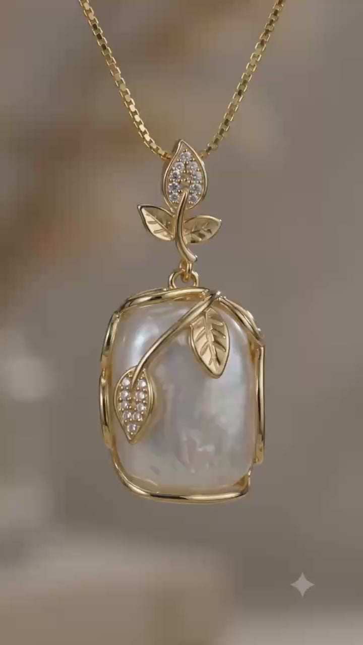 Elegant Gold Leaf Pendant Necklace with Pearl-like Stone and Crystal Accents for Women's Fashion